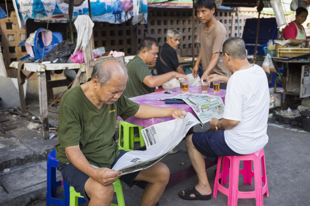 oldmanreadingnewspaper